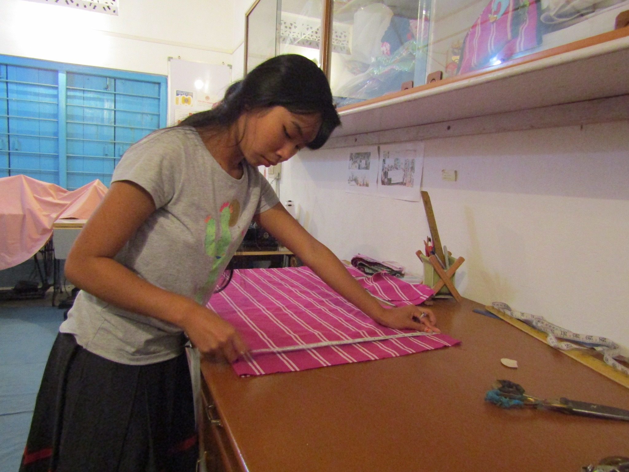 A trainee at the sewing machines