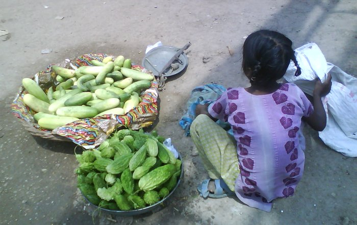 A girl working instead of attending school
