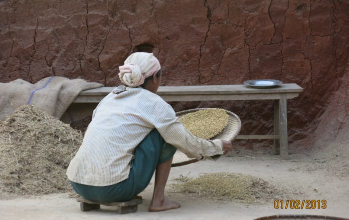 A woman working, having been denied an education