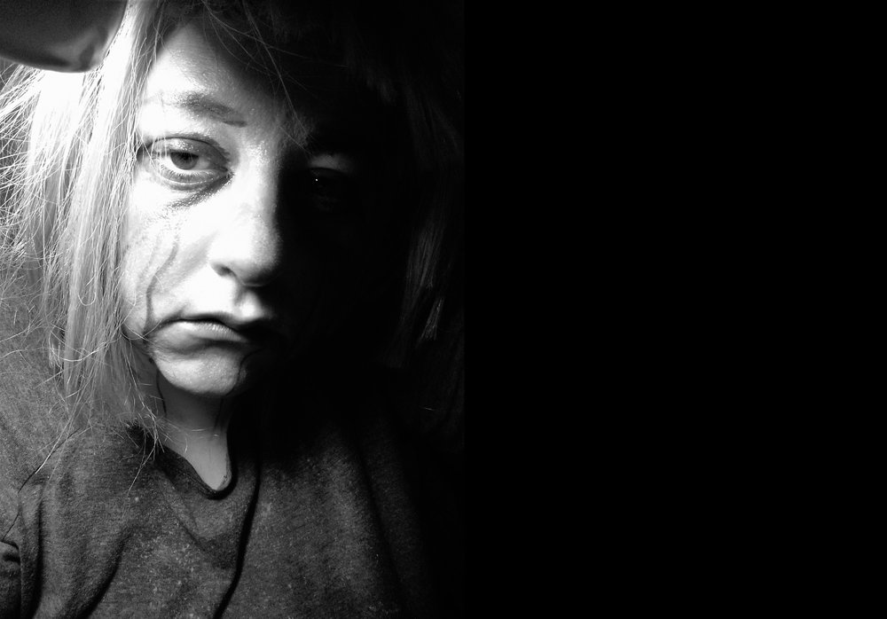 A woman affected by domestic abuse