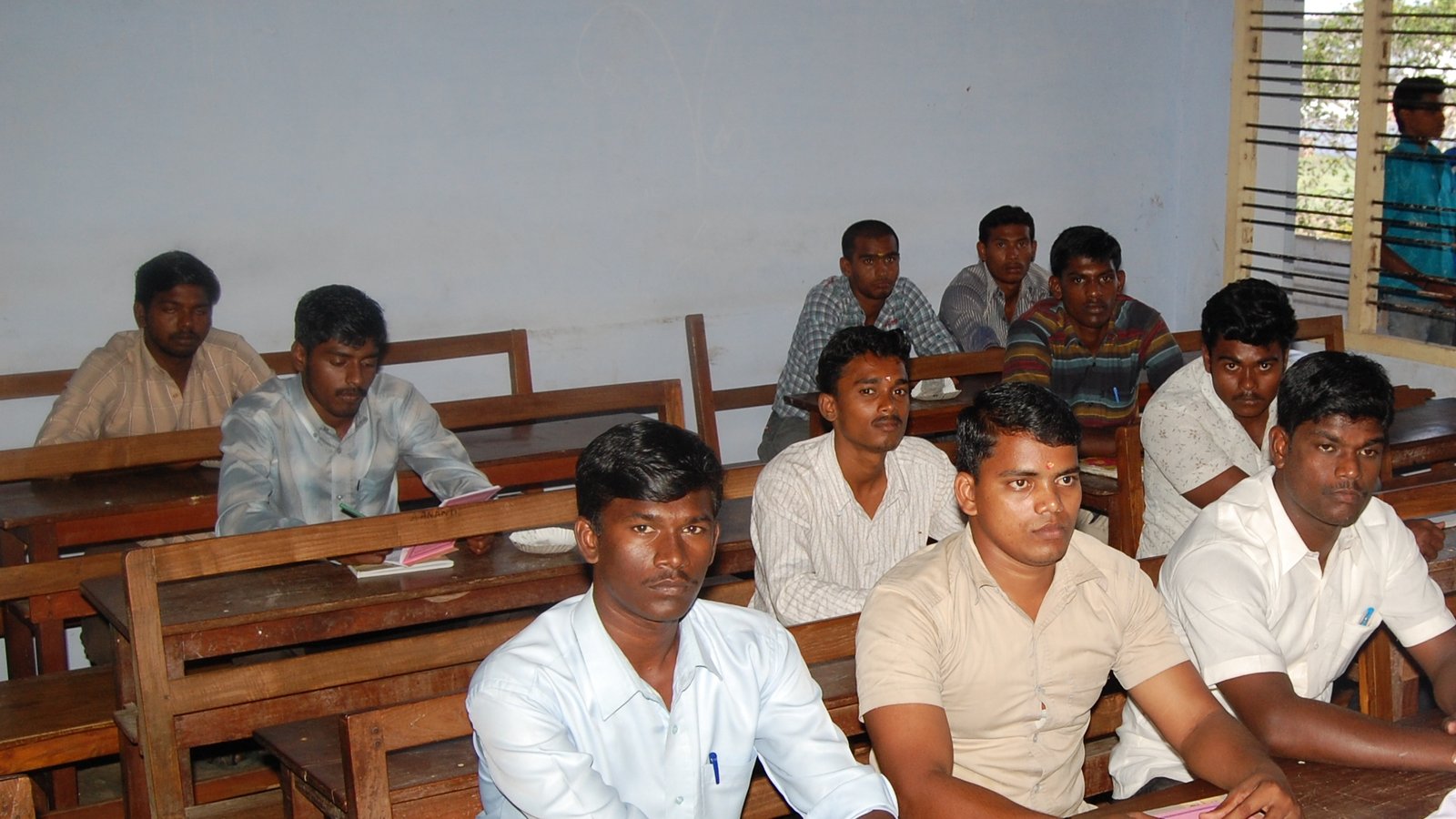 Students in a college classroom, pursuing higher education